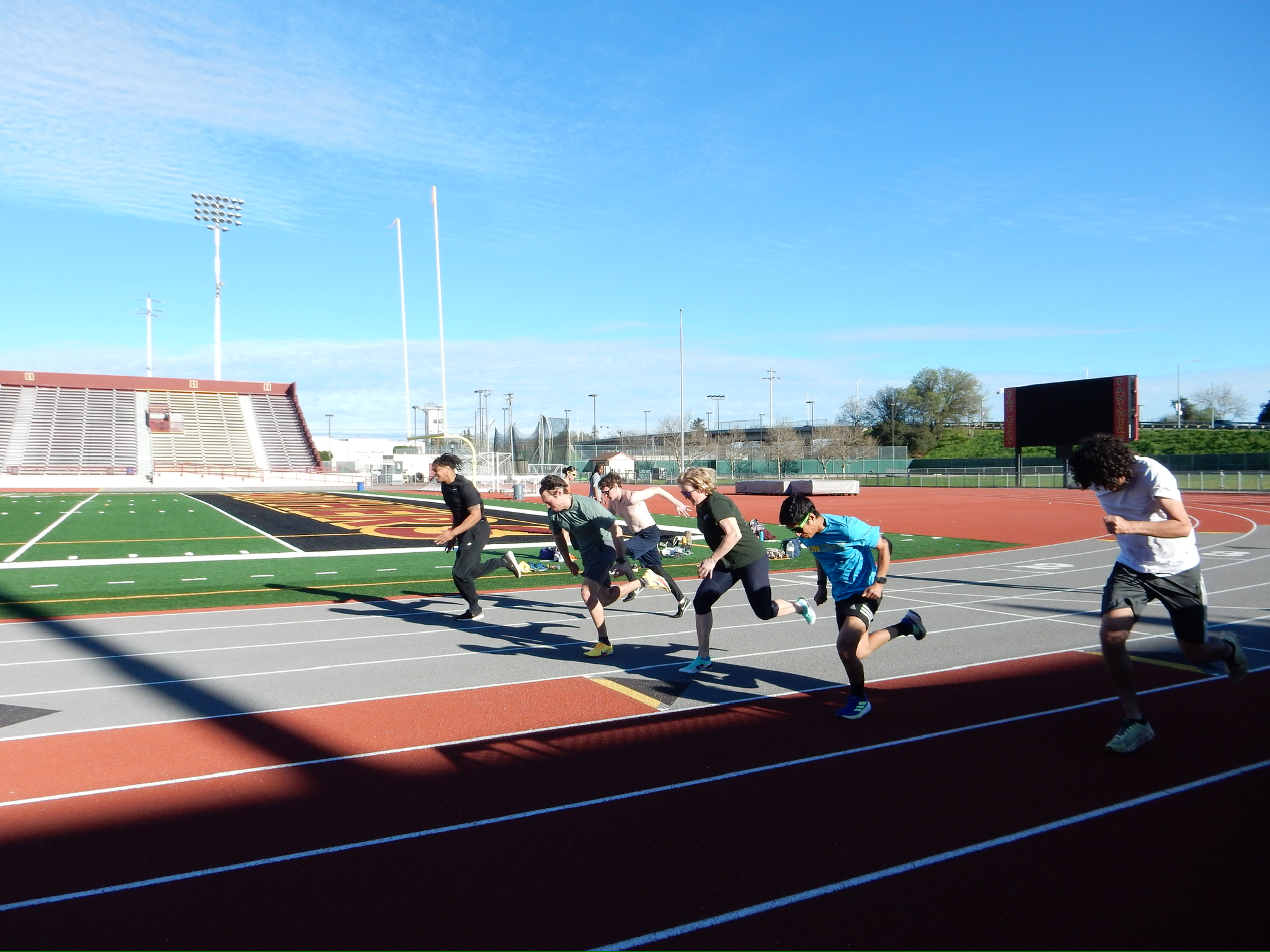 Tempo athletes running at practice